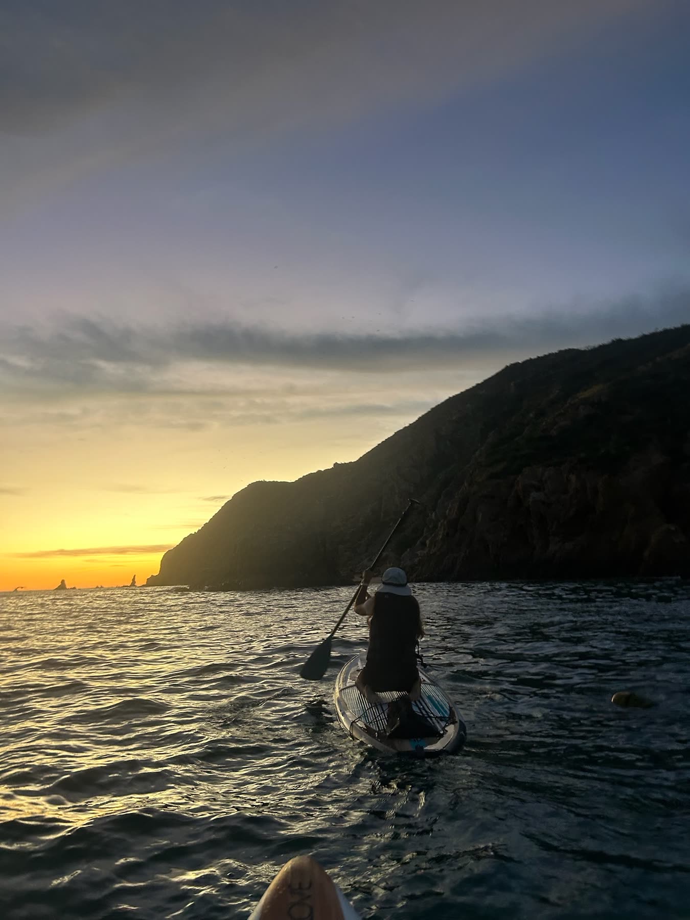 Serenity paddling at sunset near the Arch